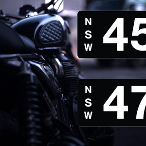 Two NSW Heritage motorbike plates